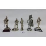 A collection of five white metal cast figures to include a Battle of Britain figures, etc tallest