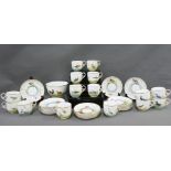 Derby white glazed cups and saucers, each with a different handpainted bird, comprising 15 cups,