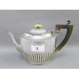 Edwardian silver teapot, with half fluted decoration, ivory finial and ebony handle, Birmingham