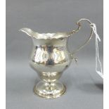 George V silver cream jug, Adie Brothers, Birmingham 1929, of helmet shape, 11cm high