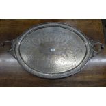 Large engraved Epns tray of oval outline with rams head handles, 80 x 50cm