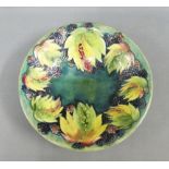 Moorcroft Pottery leaf and berry pattern bowl, with impressed facsimile signature and marks and HM