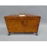 19th century walnut sarcophagus tea caddy, the hinged lid opening to reveal two lead lined