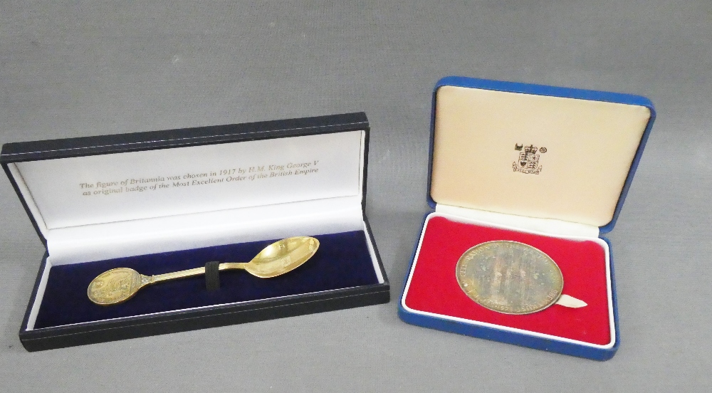 The British Empire Spoon, a silver gilt commemorative teaspoon and a Royal Mint silver QEII 25th
