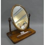 Miniature rosewood dressing table mirror with an oval swing plate, 27cm high