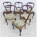 Set of six mahogany framed side chairs with carved top rails and splat and upholstered seats, on