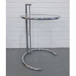 After Eileen Gray - E1027 glass and chrome side table, with adjustable height mechanism, 72cm high