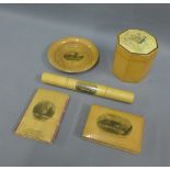 A collection of Mauchline Ware to include two notebooks, an octagonal box, and a small plate, etc (