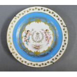 Sevres porcelain cabinet plate with handpainted putti pattern within a bleu ciel border with gilt