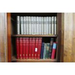 Two shelves of books to include Book of Knowledge Volumes I - XIII, Daphne Du Maurier novels,