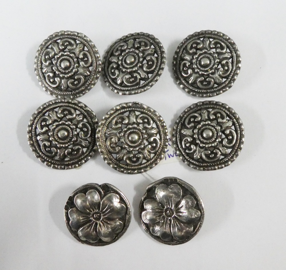A collection of silver buttons to include two London silver and six others marked 800 (8)