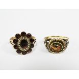 Two Victorian gemset rings to include a garnet and seed pearl flowerhead ring, both set in