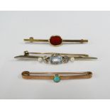 Two 9ct gold bar brooches together with an unmarked gold gemset bar brooch (3)