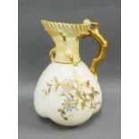 Royal Worcester blush ivory jug, handpainted with flowers and with gilt handle, puce backstamp & Reg