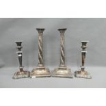 Pair of silver plate on copper candlesticks together with a smaller pair, tallest 34cm (4)