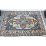 Eastern rug with ivory field and geometric borders, 300 x 195cm