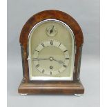 Mantle clock, with silvered dial, Roman numerals and a fast/slow subsidiary dial, 23cm high