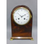 Mahogany cased mantel clock with a French movement, 25cm high
