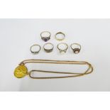 Three 9ct gold gemset rings, 9ct gold wedding band, two yellow metal dress rings and a gilt metal