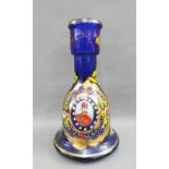 Blue glass carafe painted with a Military figure, 28cm high