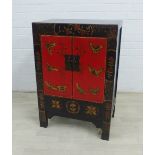 Chinoiserie painted two door cabinet with a shelved interior, 86 x 58cm