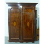 Mahogany and inlaid wardrobe, the moulded cornice over two doors with shell paterae, the interior