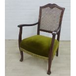 Early to mid 20th century open arm chair with cane work back and upholstered seat, 91 x 60cm
