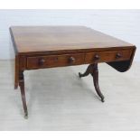 19th century rosewood and inlaid sofa table, with two drop leaves, shaped side supports with brass