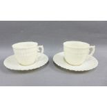 Pair of Belleek porcelain cups and saucers, with green Fermanagh backstamp (4)