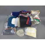Collection of lady's fashion scarves, handkerchief, studded evening bags, etc (a large lot)