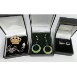 A pair of silver gemset earrings, a silver pendant necklace, green hardstone hoop earrings and a