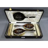 George V silver and tortoiseshell brush set with pique work decoration, comprising two