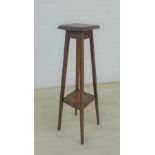 Early 20th century oak two tier plant stand, 91 x 21cm