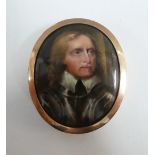 Oliver Cromwell an oval portrait miniature, in a gilt metal frame with rose coloured border 4 x 3cm