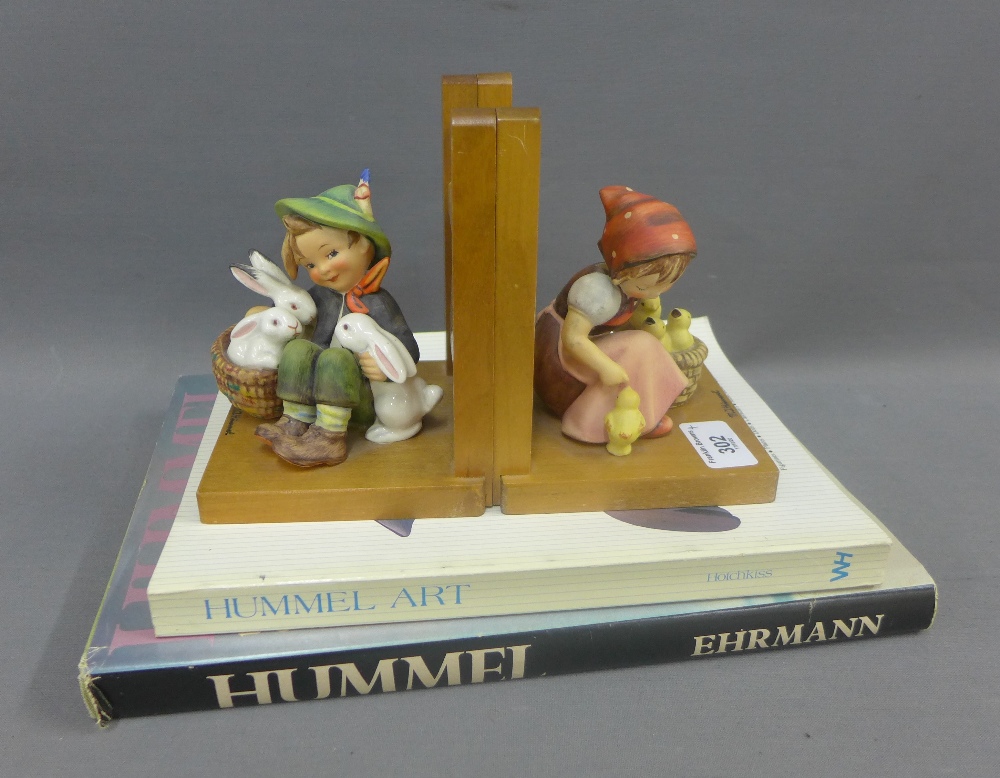 Pair of Hummel bookends and two Hummel collector's Books to include Hummel Art by John Hotchkiss and