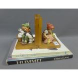 Pair of Hummel bookends and two Hummel collector's Books to include Hummel Art by John Hotchkiss and