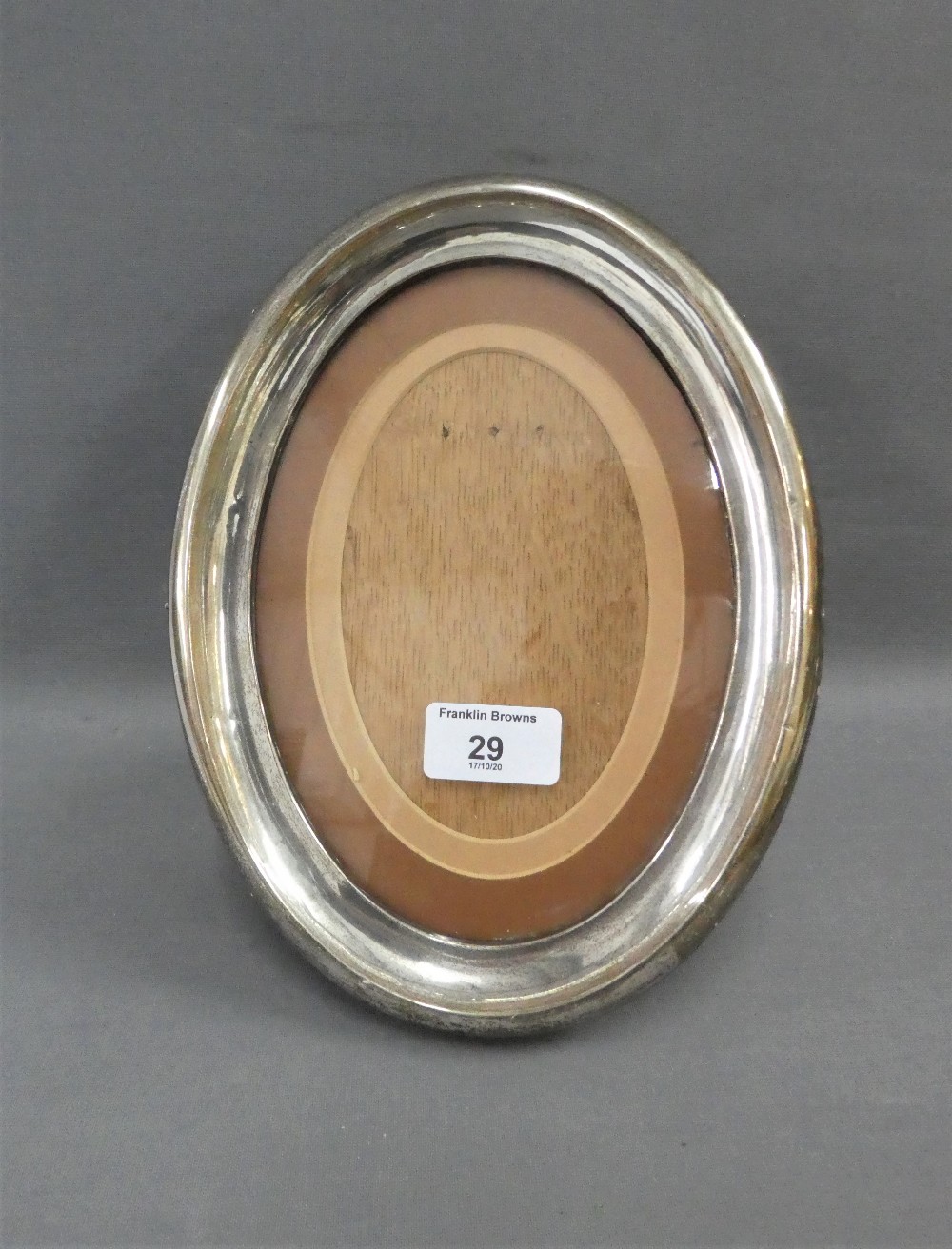 George V silver photograph frame with oak strut back, Birmingham 1914, 25cm