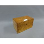 19th century birds eye maple tea caddy box, the hinged lid opening to reveal two lead lined