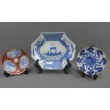 Chinese blue and white dish and two saucers, (3)