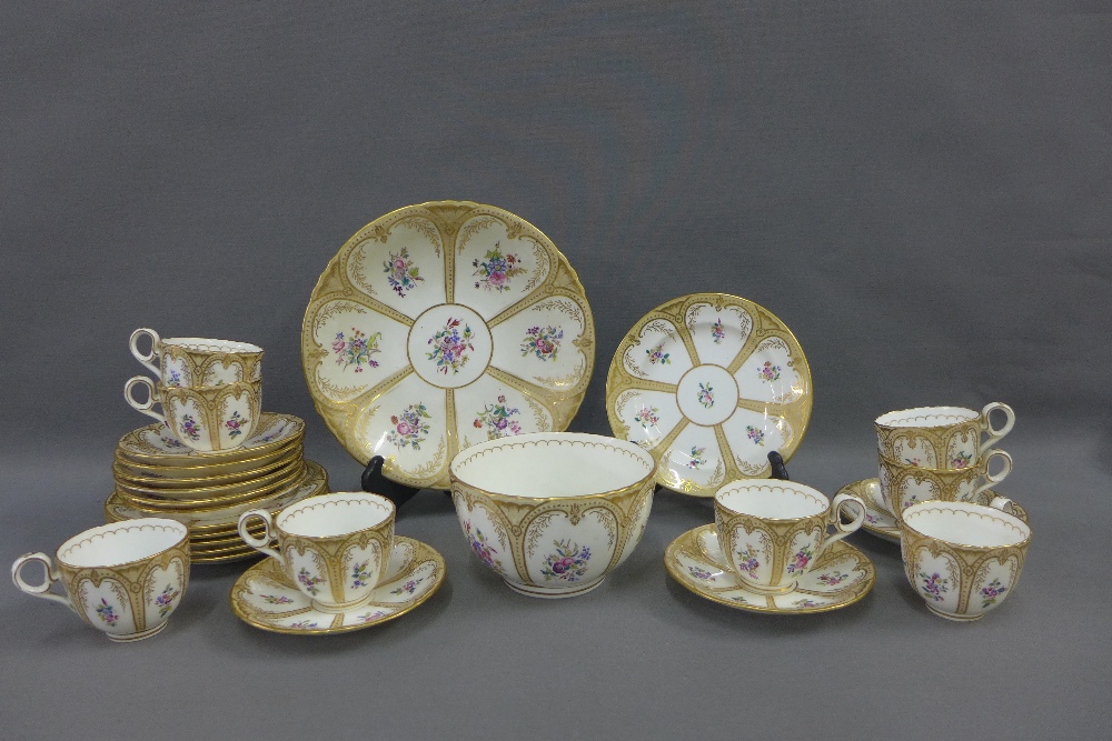 19th century English porcelain teaset with handpainted floral sprays and with gilt border rims,