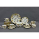 19th century English porcelain teaset with handpainted floral sprays and with gilt border rims,