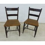 Pair of ebonised side chairs with floral painted toprails and woven seats, 84 x 43cm (2)