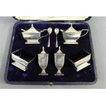 George V six piece silver cruet set, Birmingham 1919, in fitted case (6)