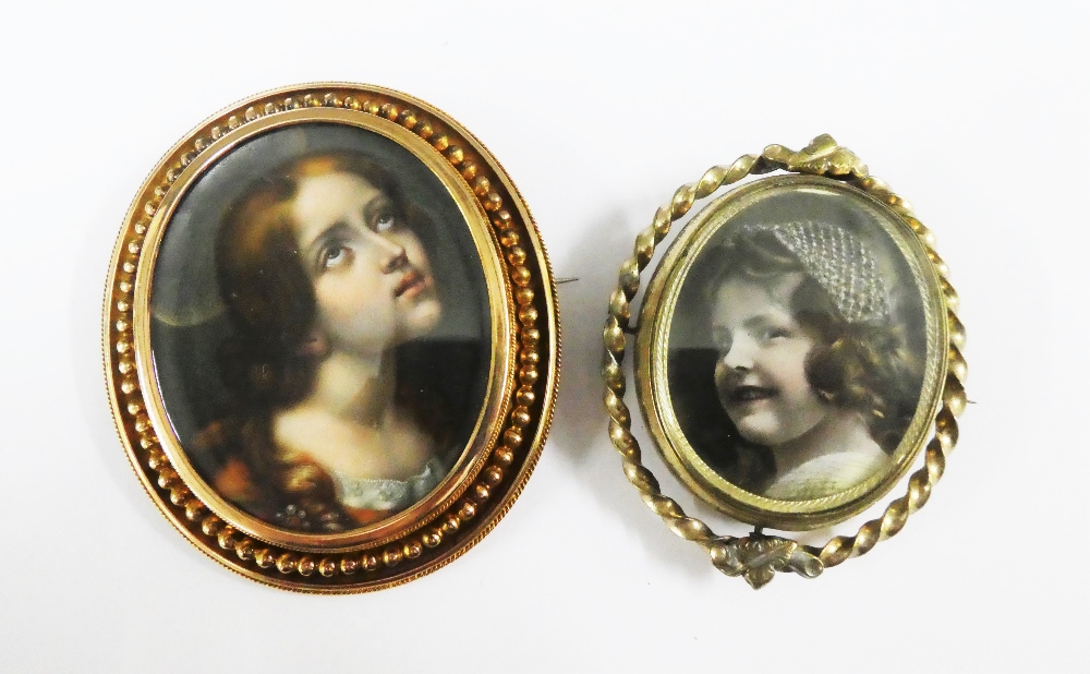 Late 19th / early 20th century double locket brooch containing a portrait miniature of Mary