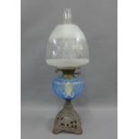 Oil lamp with blue glass well and an etched glass shade, complete with glass funnel, size overall