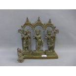 Indian bronze depicting three figures, each modelled standing beneath a triple archway, with another