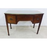 Mahogany bow front side table with central long drawer flanked by cupboard doors, on tapering legs
