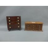 Stained pine miniature chest with four graduating long drawers and smaller chest, 20 x 18cm (2)