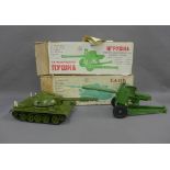 A Russian model of a toy Tank and Artillery Unit, boxed, approx 45cm long, (2)