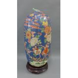 Large Japanese vase, the blue ground painted with chrysanthemum, bird and foliage pattern, the lid